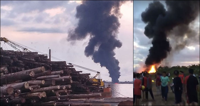 Kepulan asap hitam pekat dari kapal LCT Mitra Kaltim yang terbakar terlihat jelas dari kejauhan